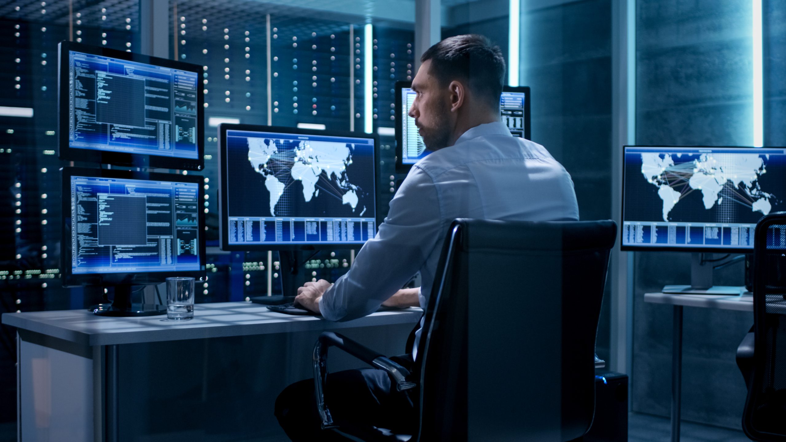 Technical,Controller,Working,At,His,Workstation,With,Multiple,Displays.,Displays